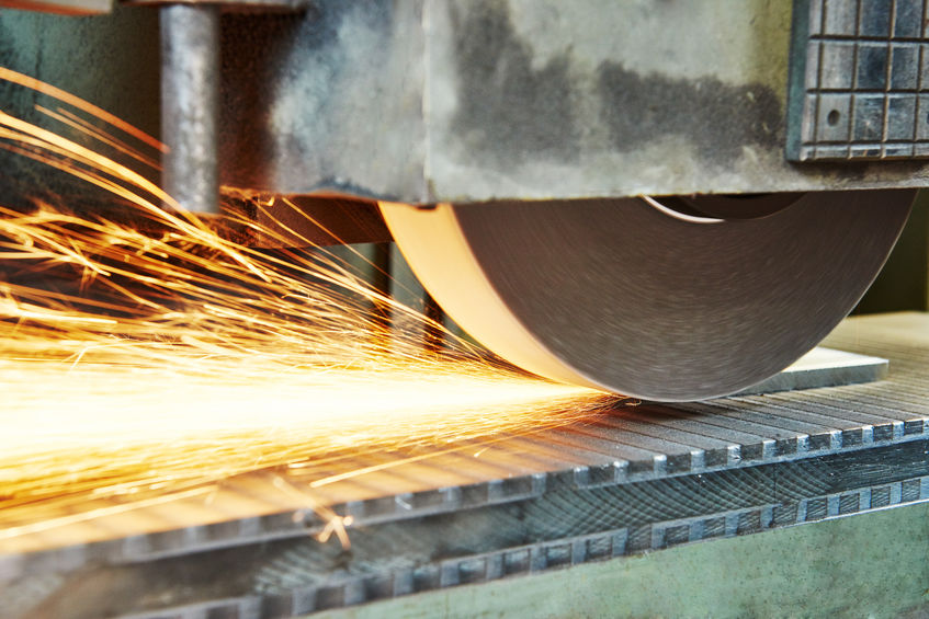 metalworking machining - finishing or grinding metal surface on horizontal grinder machine